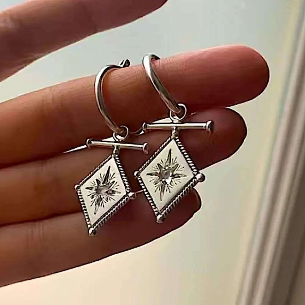 Silver North Star Starburst Zircon Dangle Drop Earrings